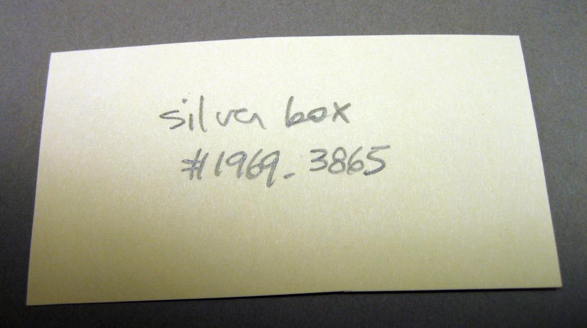 1969.3865 Silver Box label side 1