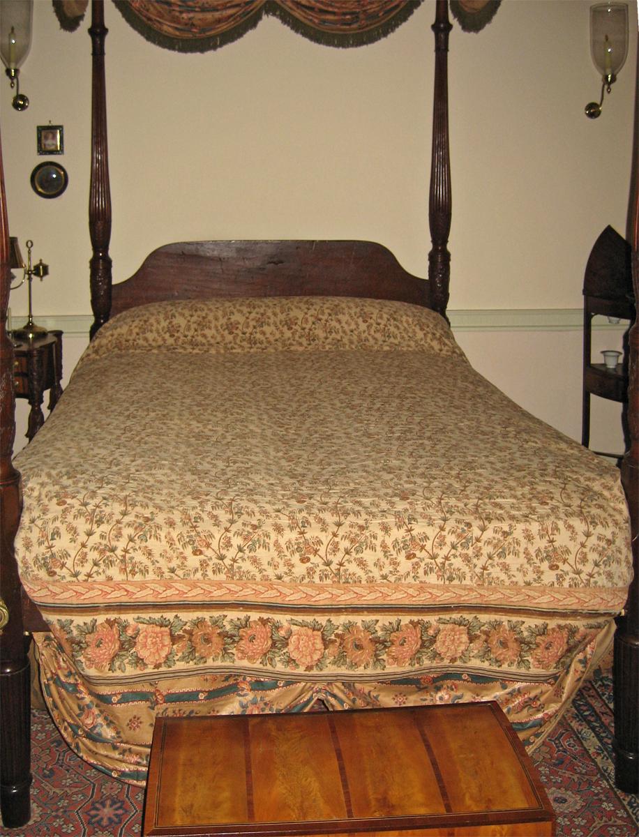 1969.3900 quilt on bedstead 1955.0795