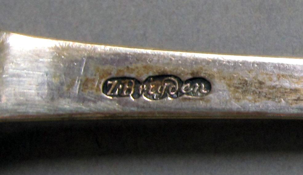 1957.0123 Silver spoon mark
