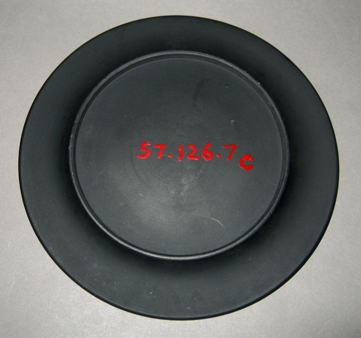 1956.0126.007 C Black basalt plate (underside)