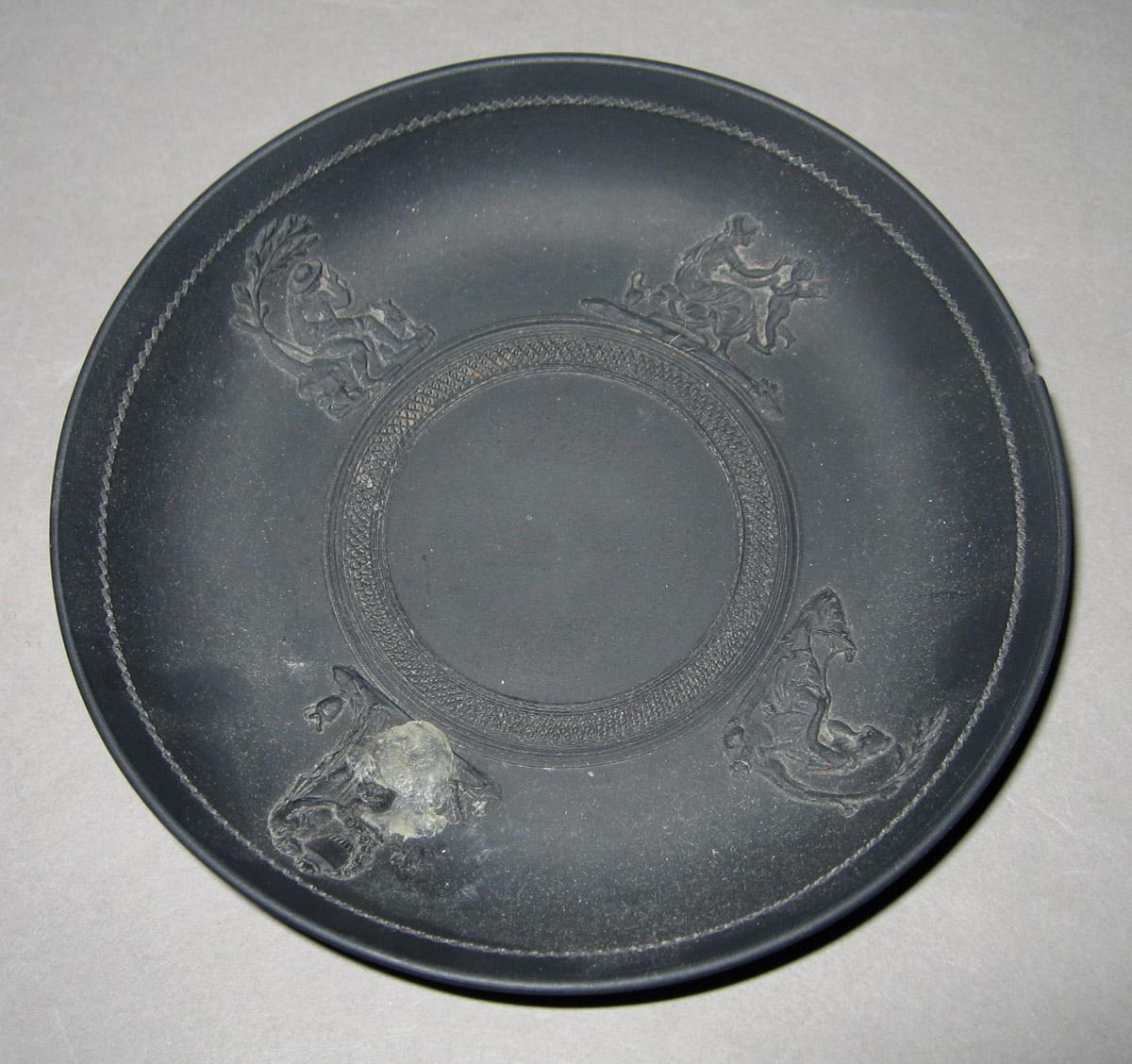 1957.0126.015 Black basalt saucer