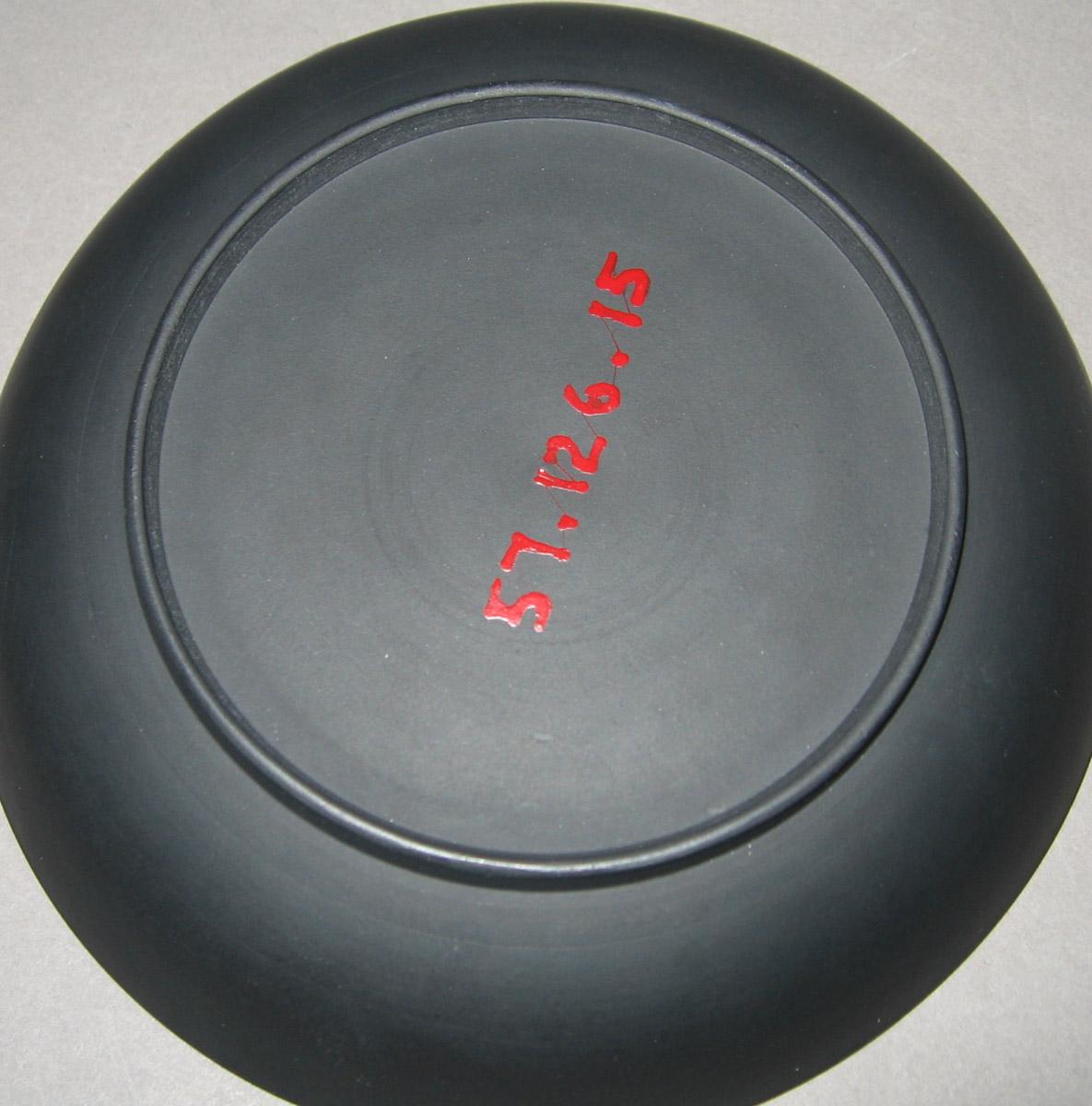1957.0126.015 Black basalt saucer (underside)
