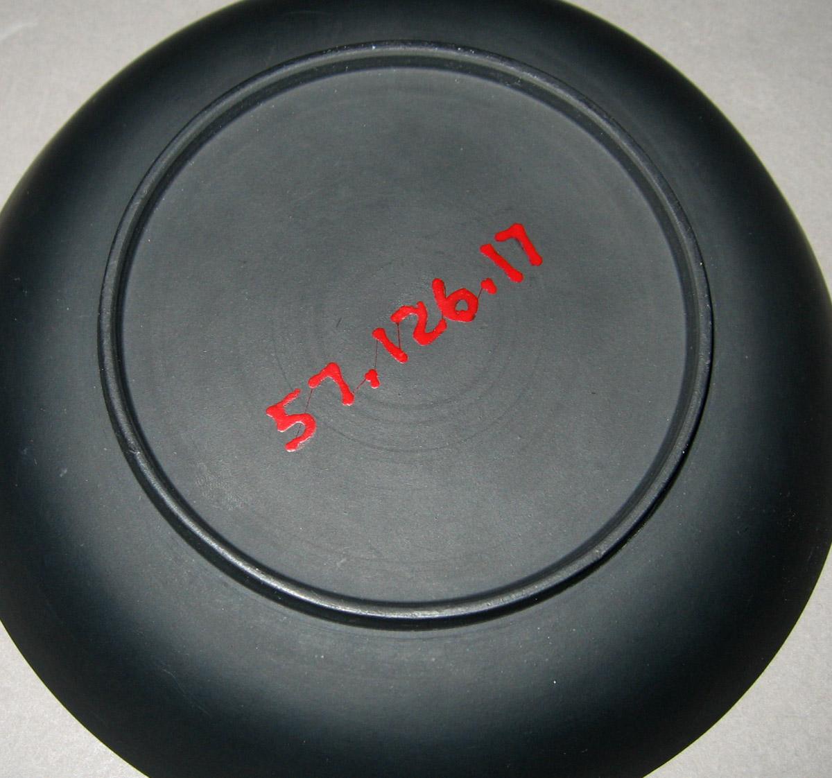 1957.0126.017 Black basalt saucer (underside)