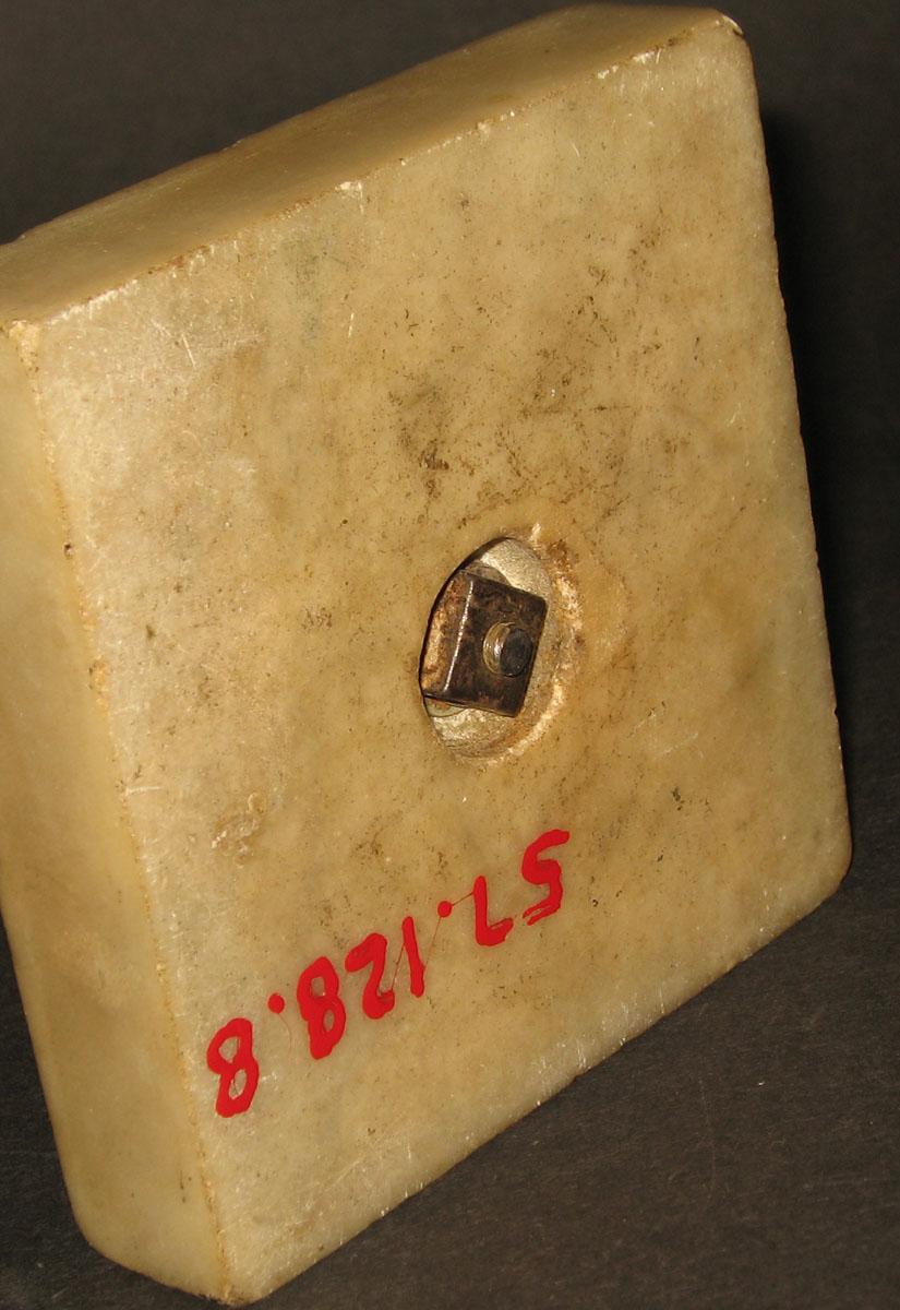 1957.0128.008 Glass lamp  (underside of marble base)