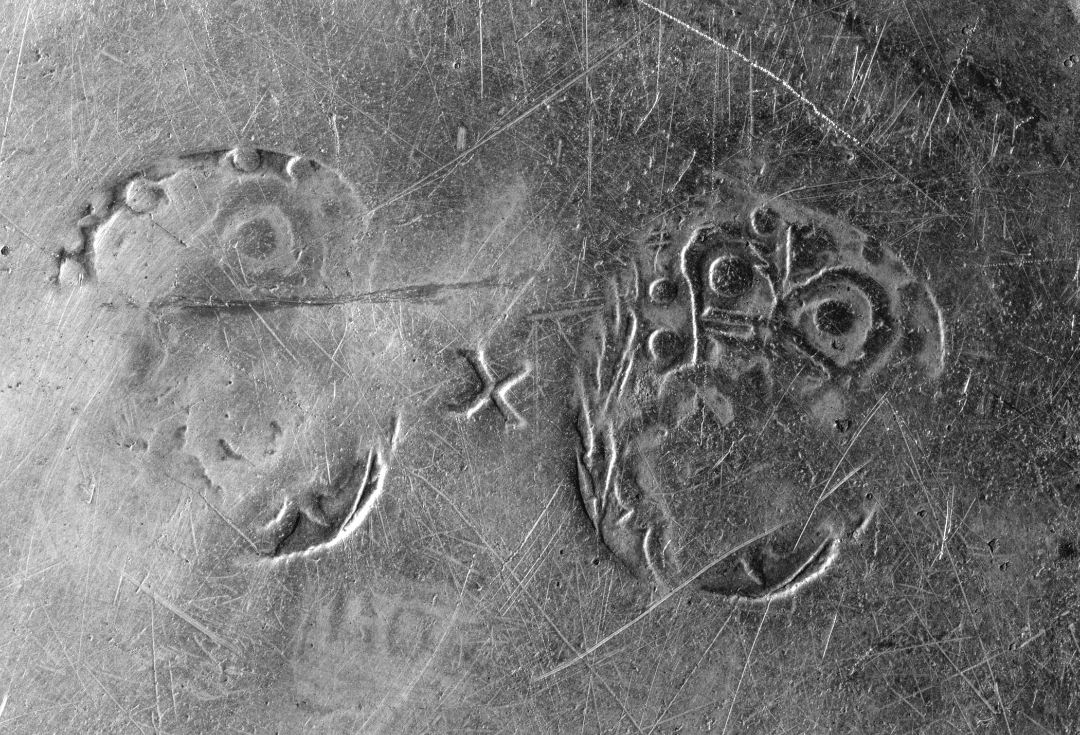 1957.0131 Pewter plate, marks