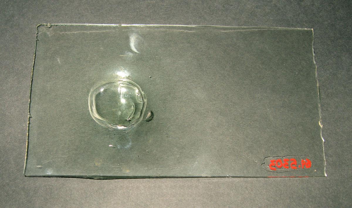 1969.5303 Glass window pane