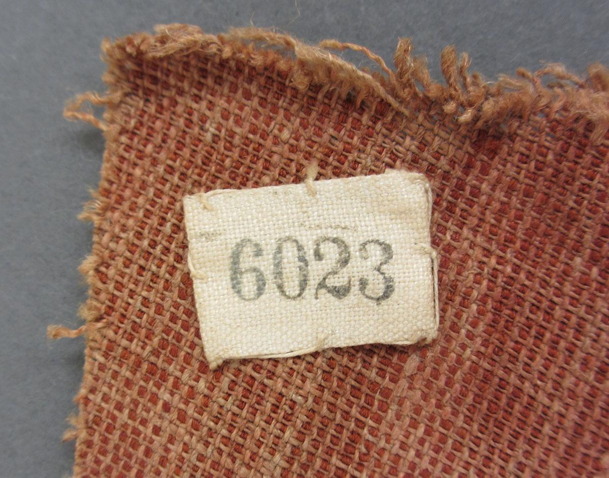 1969.5335 Textile, velvet label