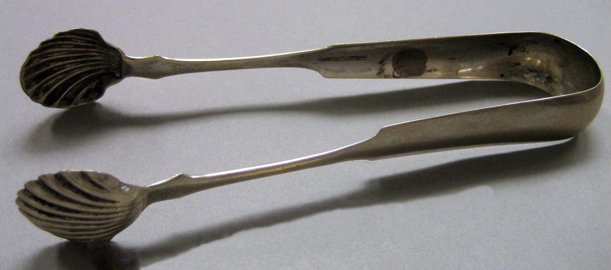 1970.0028 Silver Tongs view 1