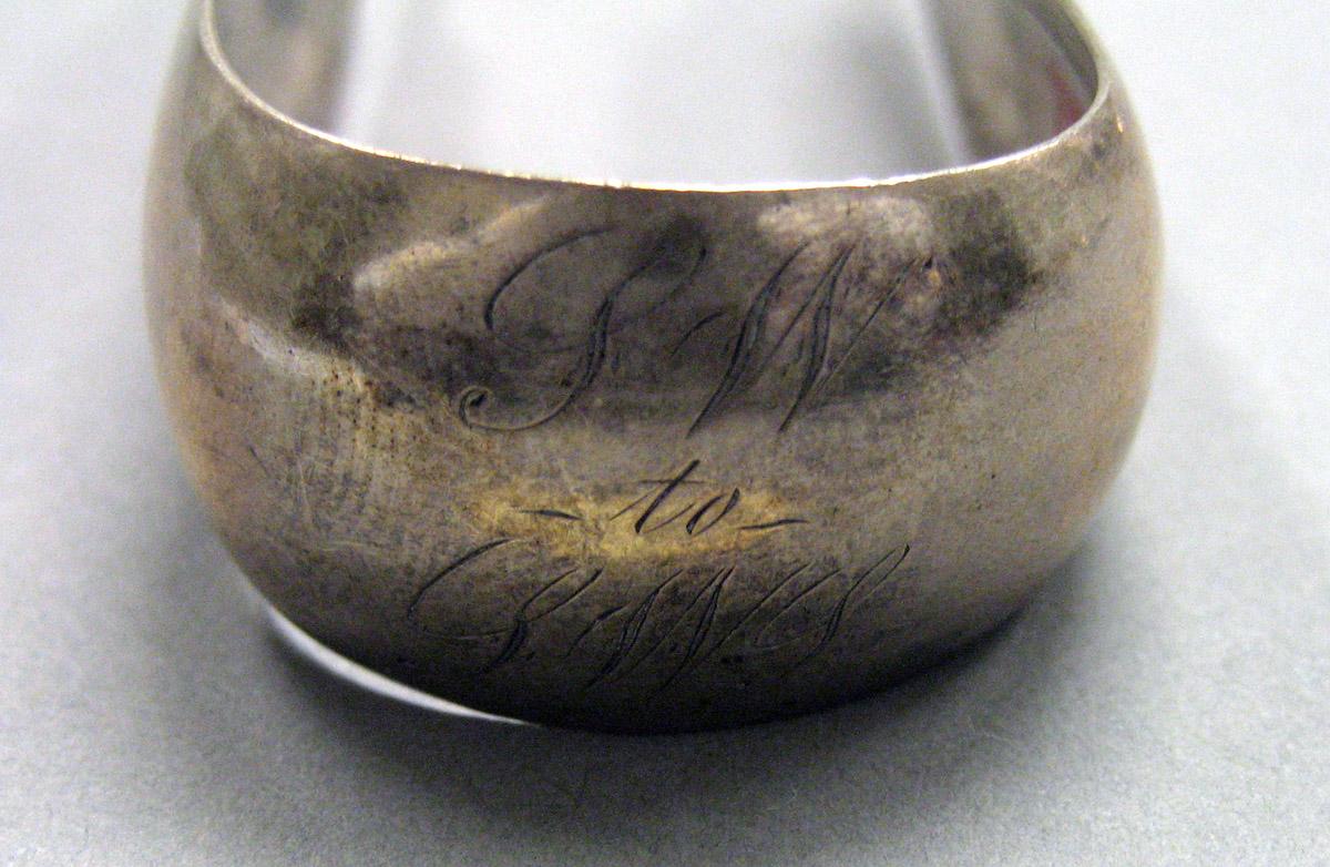 1970.0028 Silver Tongs engraving