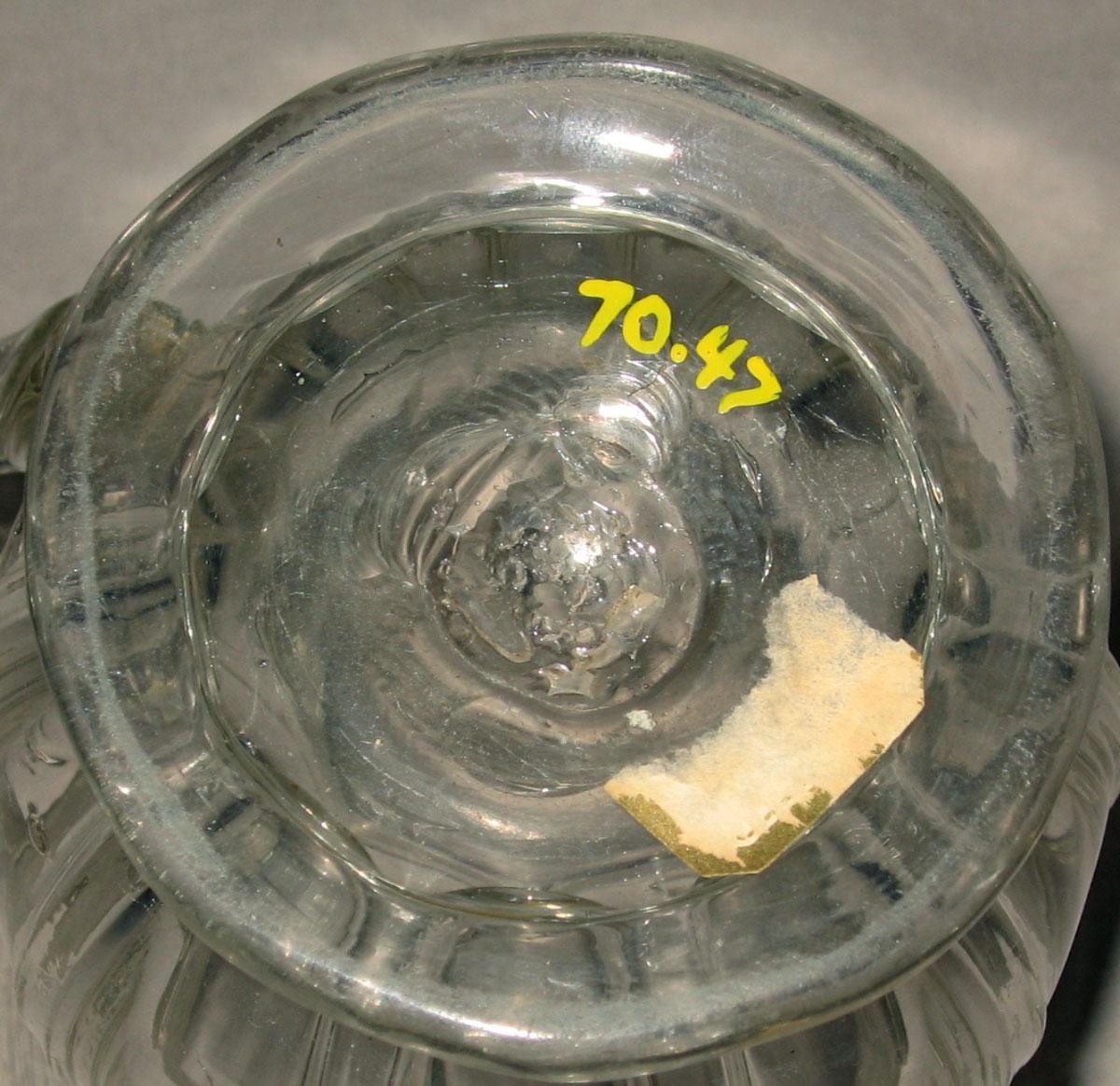 1970.0047 Glass mug (underside)
