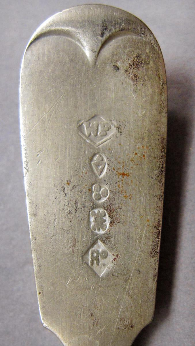1970.0056 Teaspoon mark
