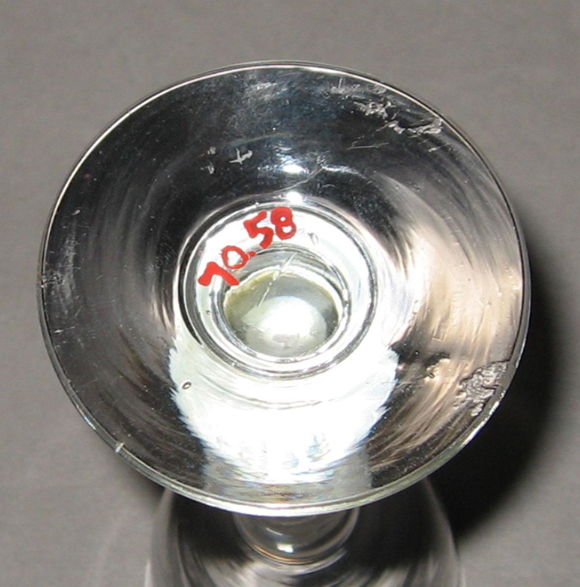1970.0058 Glass wine glass (underside)