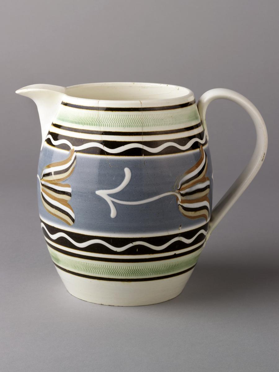 1970.0063 Dippedware jug with tulips