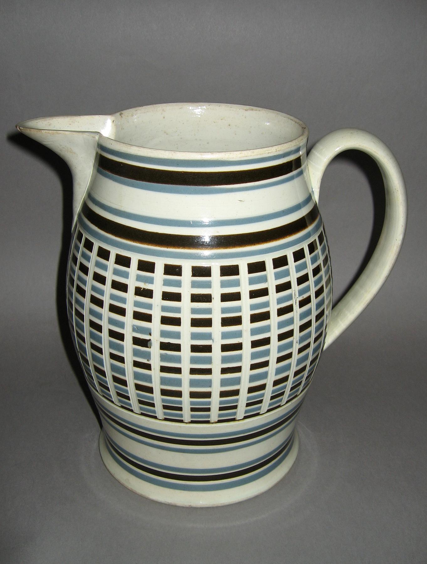 1970.0064 Dipped ware inlaid jug