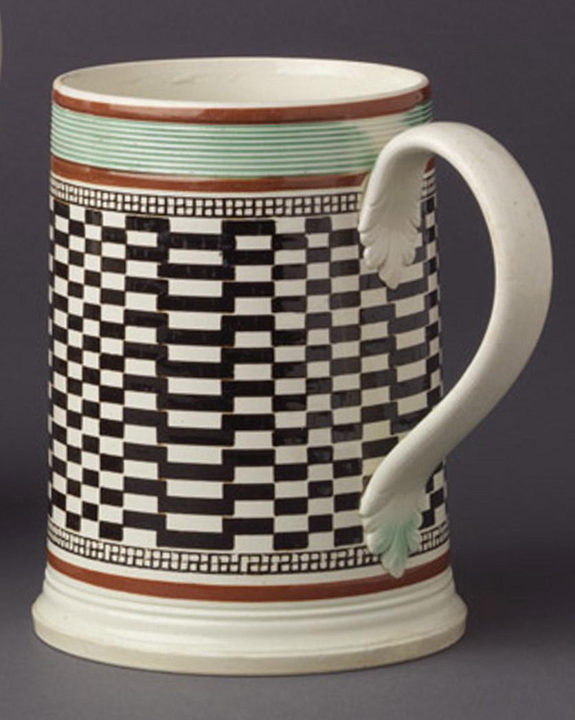 1970.0068 Engine turned dipped ware mug