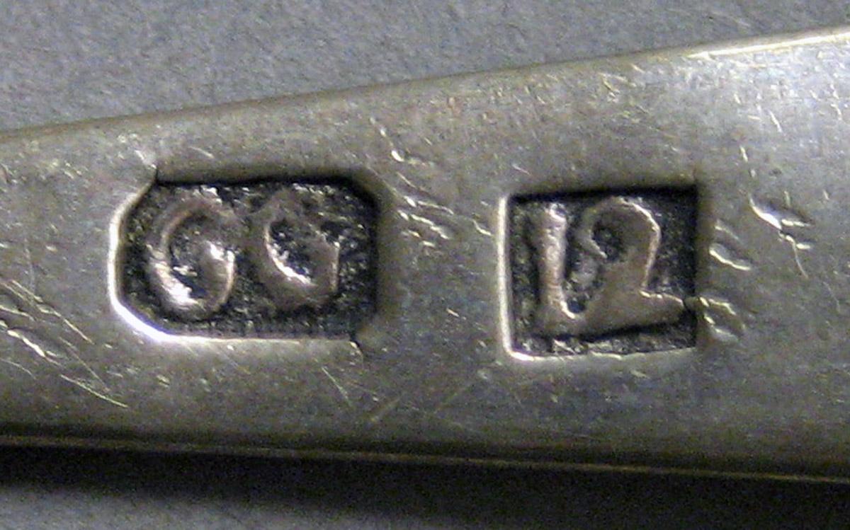 1970.0147 Teaspoon mark