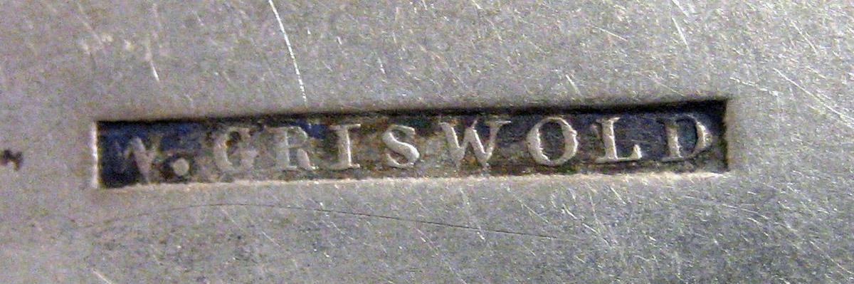 1970.0159 Teaspoon mark