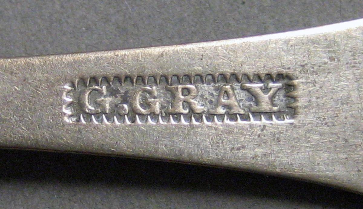 1970.0164 Teaspoon mark