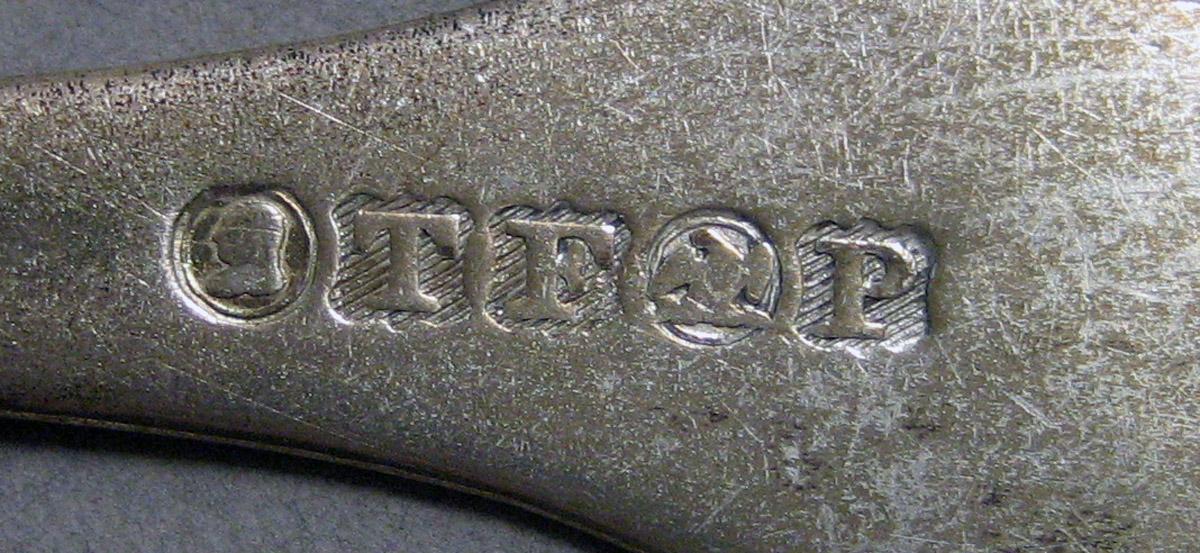 1970.0189 Teaspoon mark