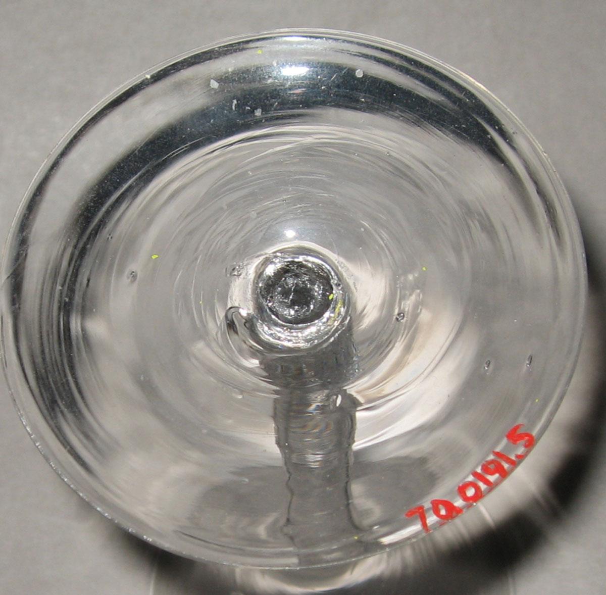 1970.0191.005 Lead glass wine glass (underside)