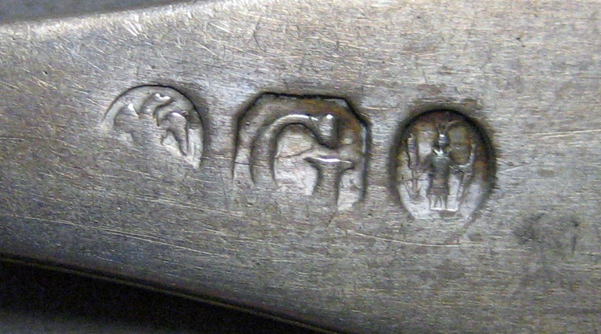 1970.0242 Teaspoon mark