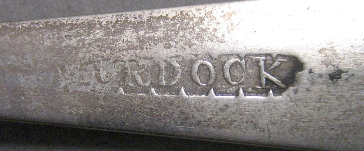 1970.0245 Teaspoon mark