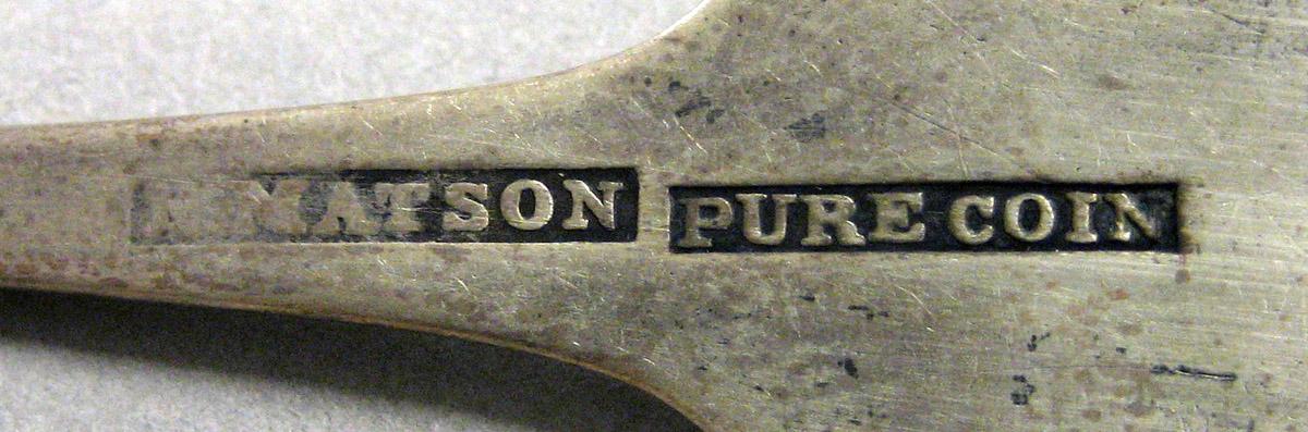 1970.0249 Teaspoon mark