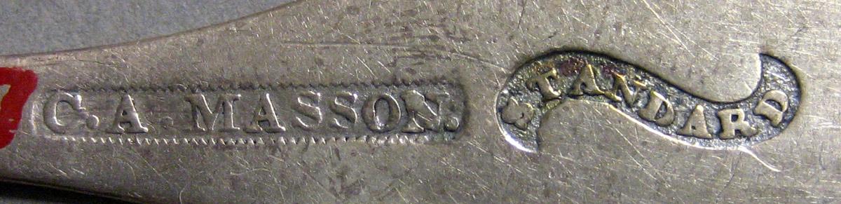 1970.0257 Teaspoon mark