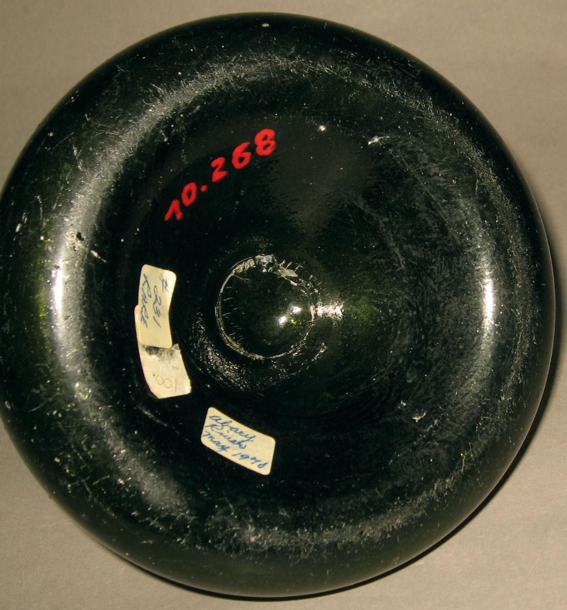 1970.0268 Glass bottle (underside)