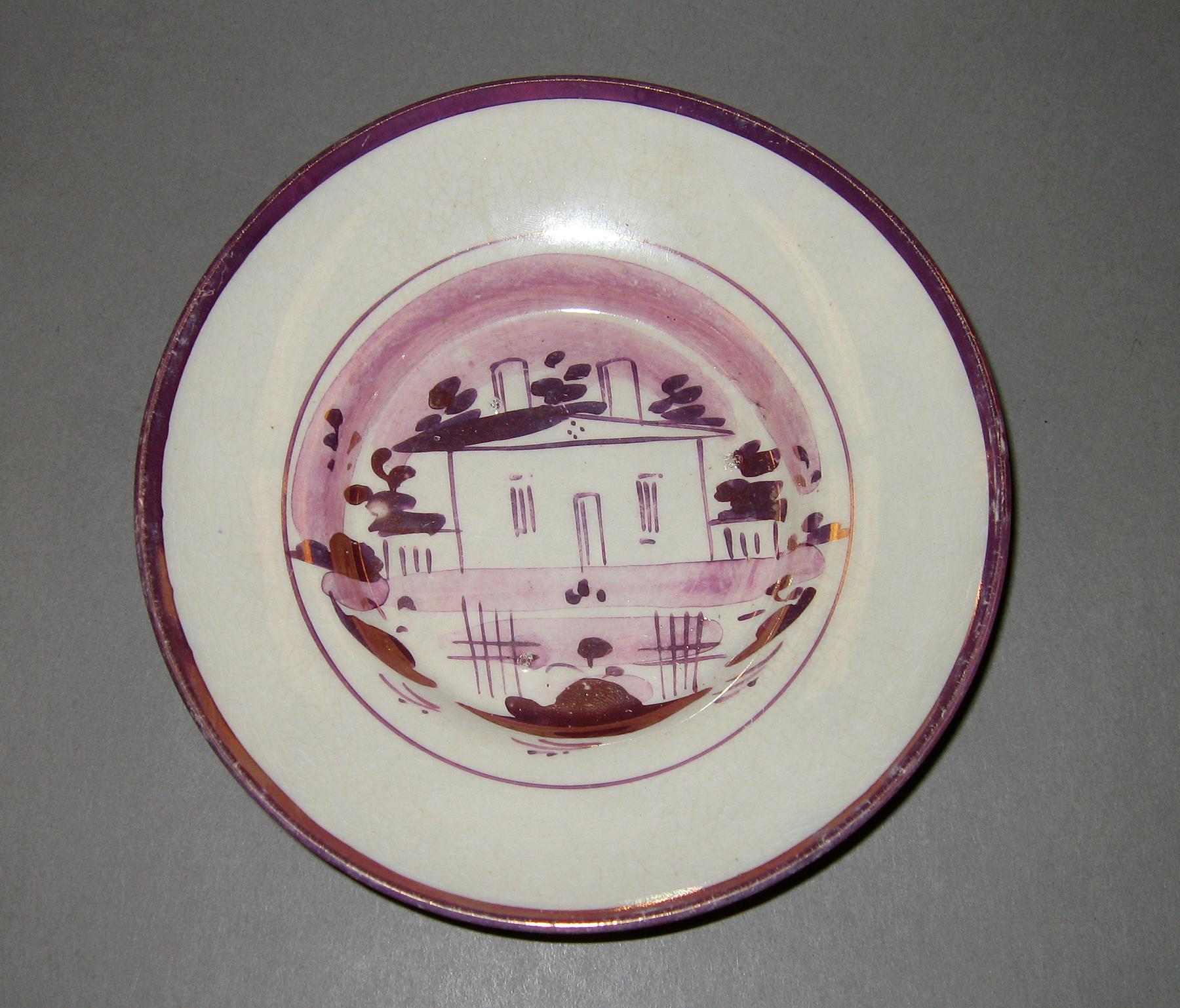 1970.0278 Pink luster saucer
