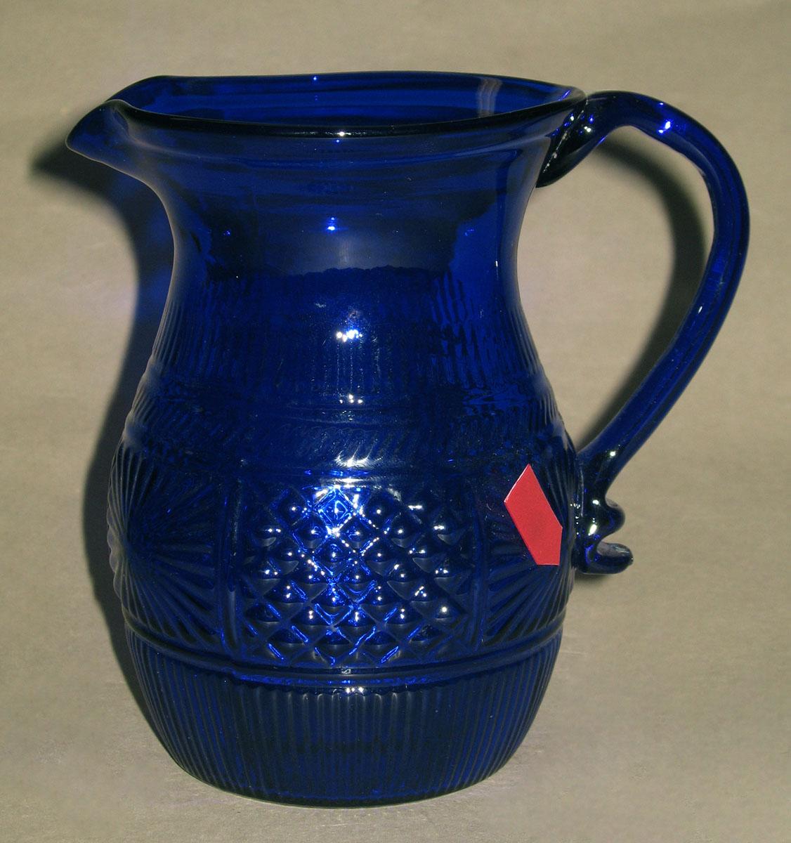 1970.0344 Blue glass jug
