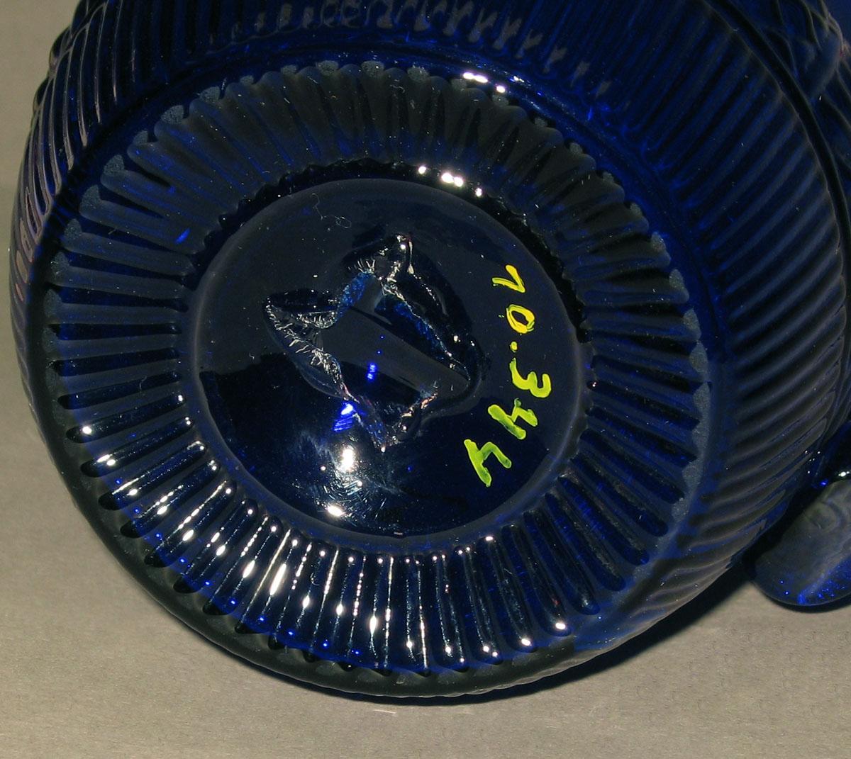1970.0344 Blue glass jug (underside)