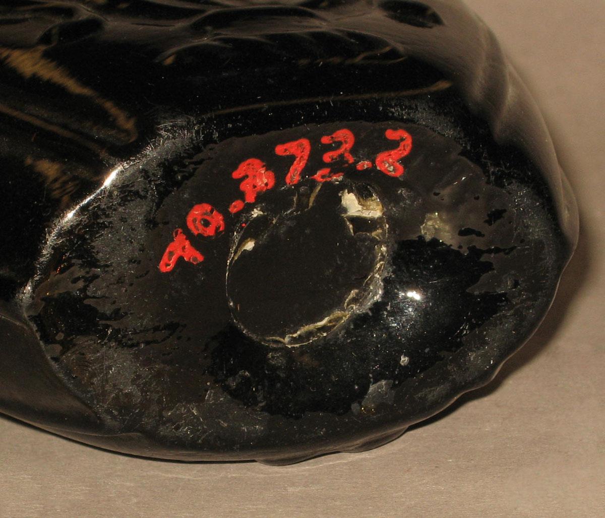1970.0373.002 Glass flask (underside)