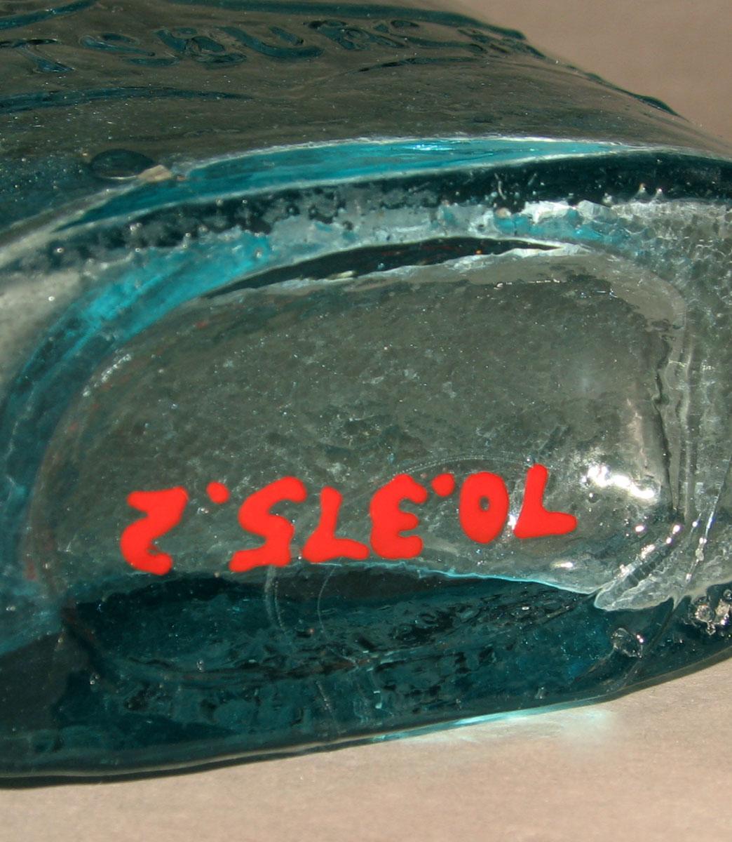 1970.0375.002 Glass flask (underside)