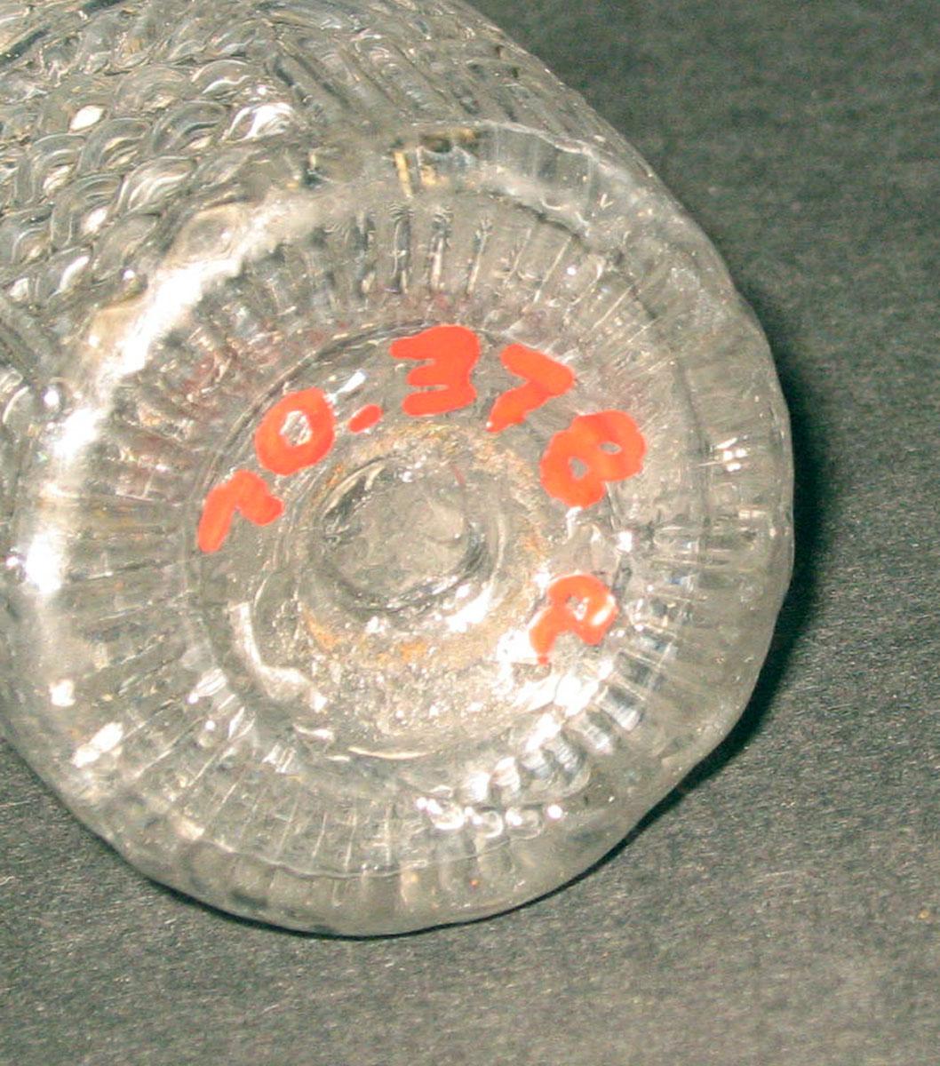 1970.0378 A Glass caster bottle (underside)