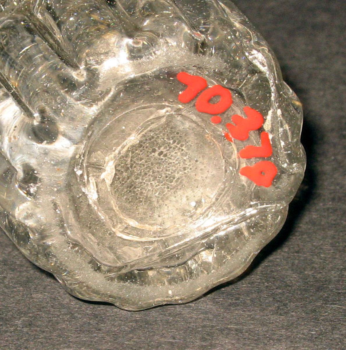 1970.0379 Glass caster bottle (underside)
