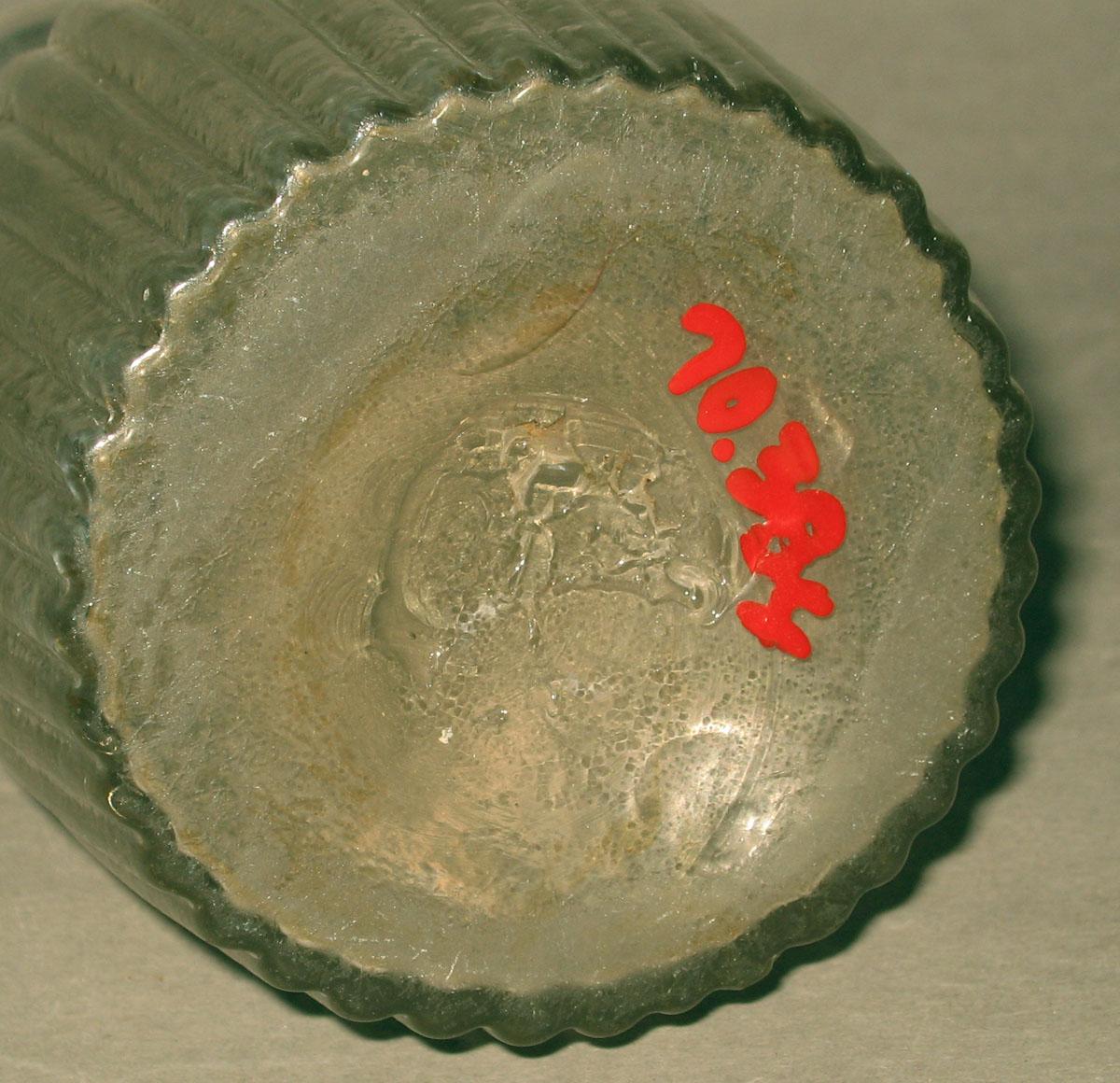 1970.0384 Glass bottle (underside)