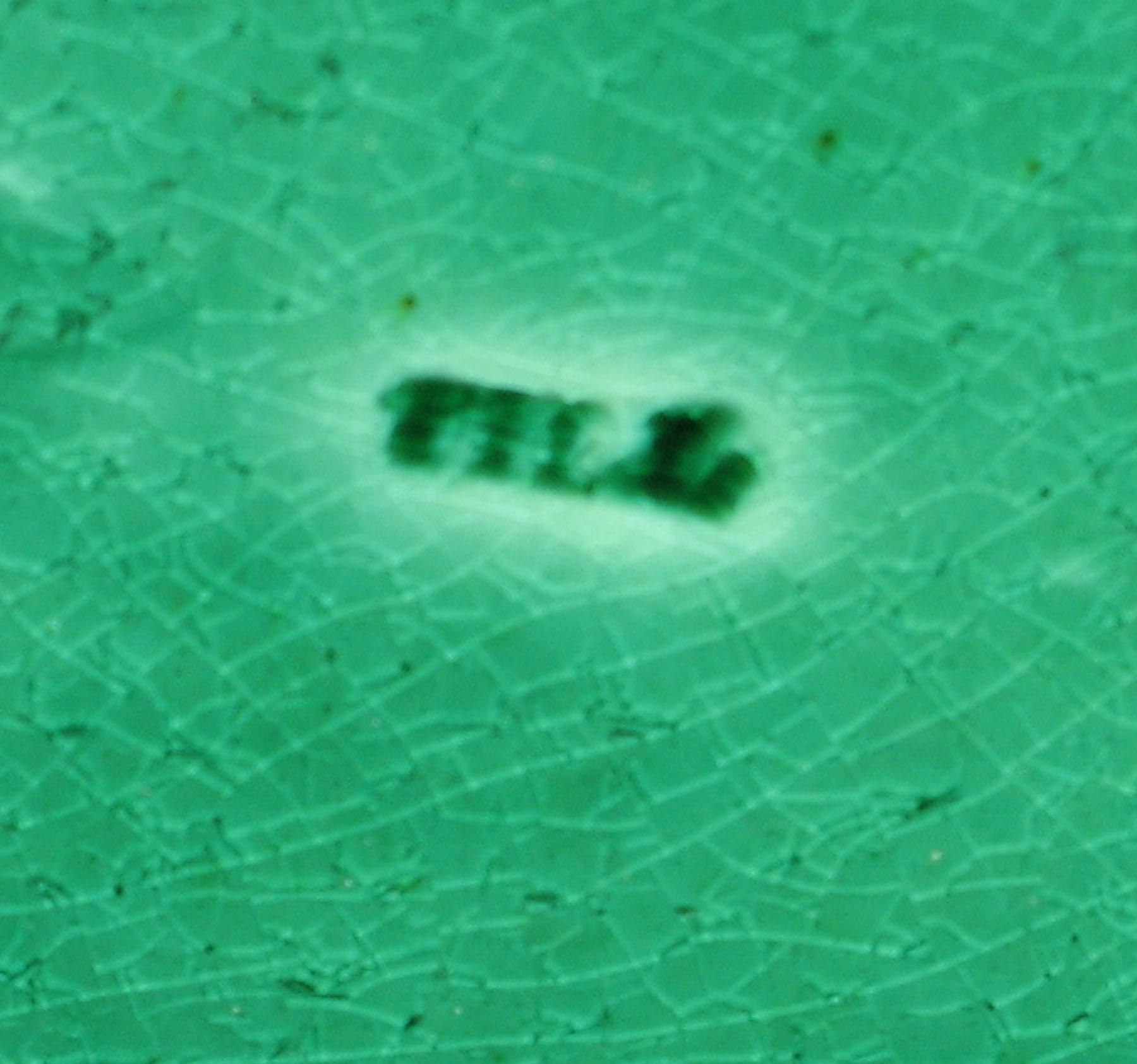 1970.0607 Green glaze plate (mark)