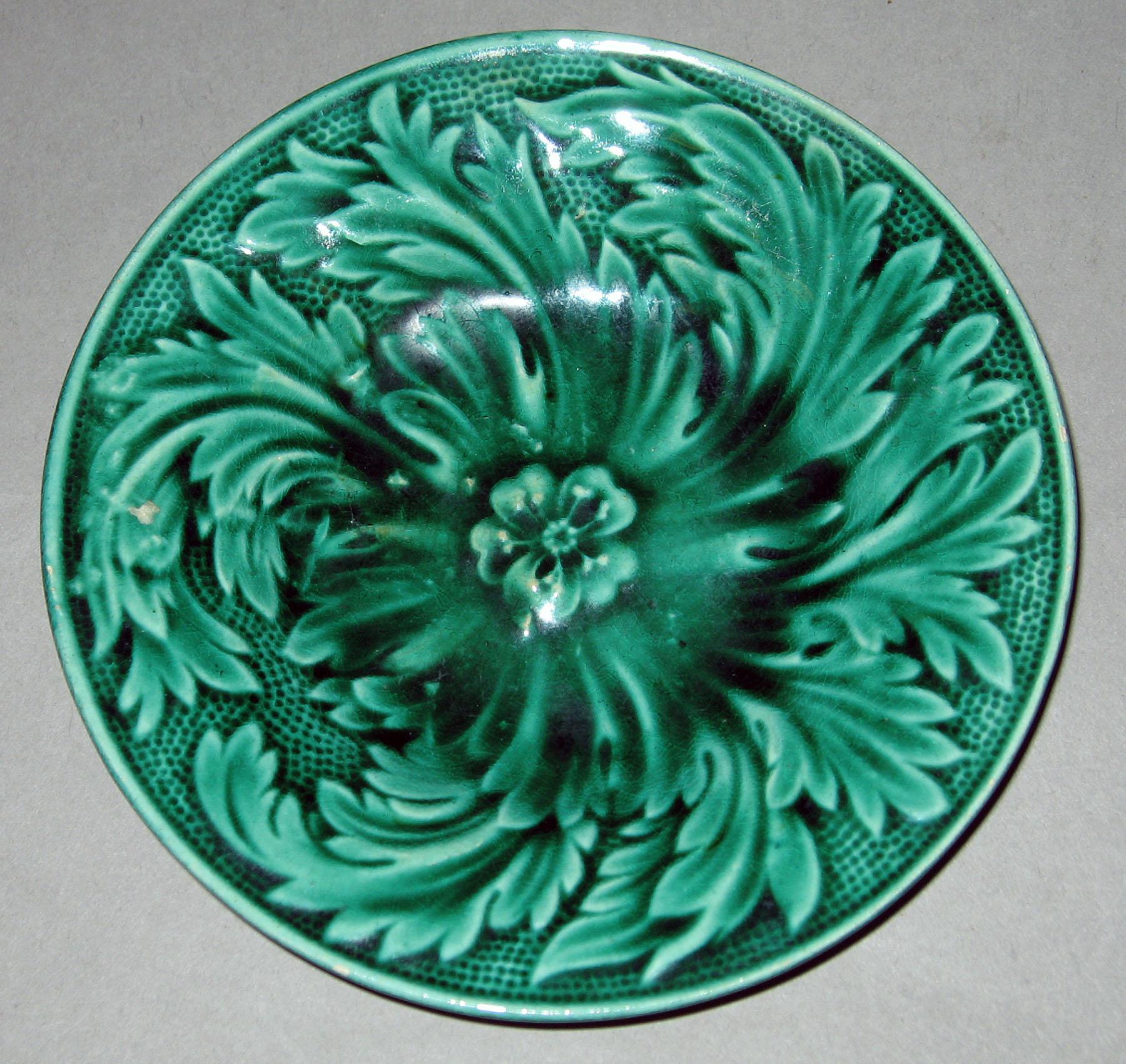 1970.0977.001 Green glaze earthenware plate