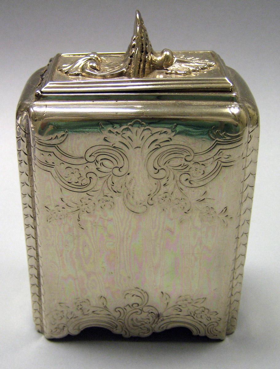 1970.1028 Silver Tea canister side 1