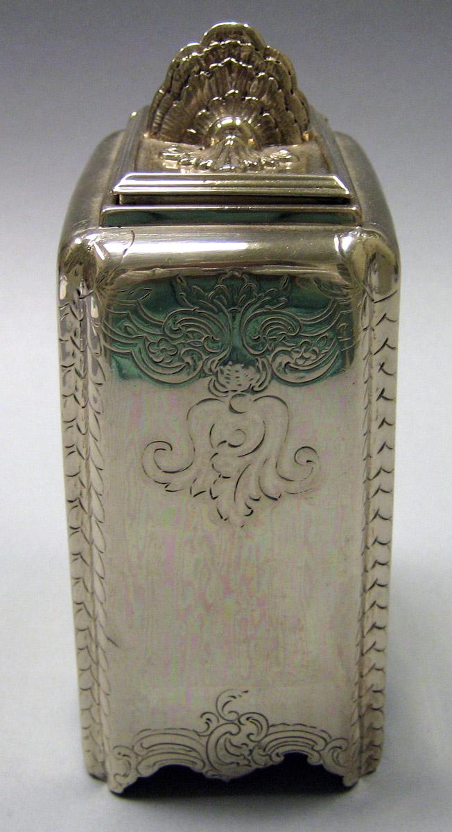 1970.1028 Silver Tea canister end view