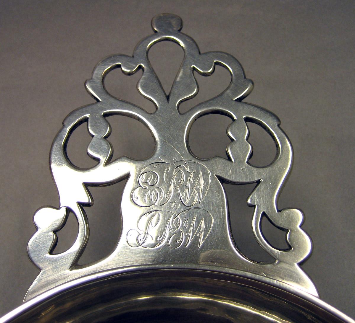 1970.1033 Silver Porringer handle and engraving