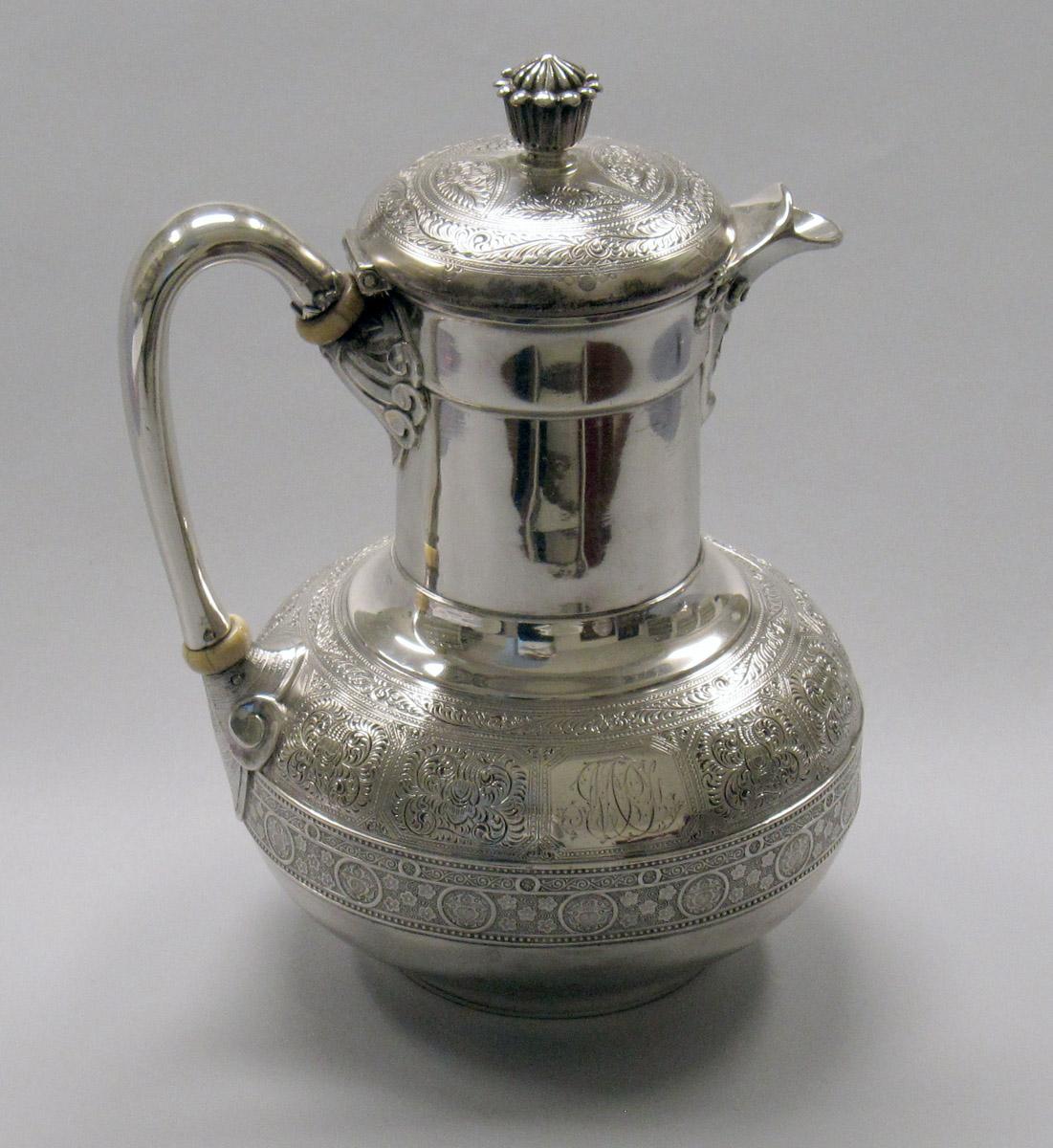 1970.1039.004 Milk pot, side 1