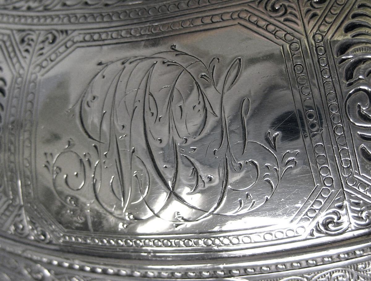 1970.1039.004 Milk pot, engraving