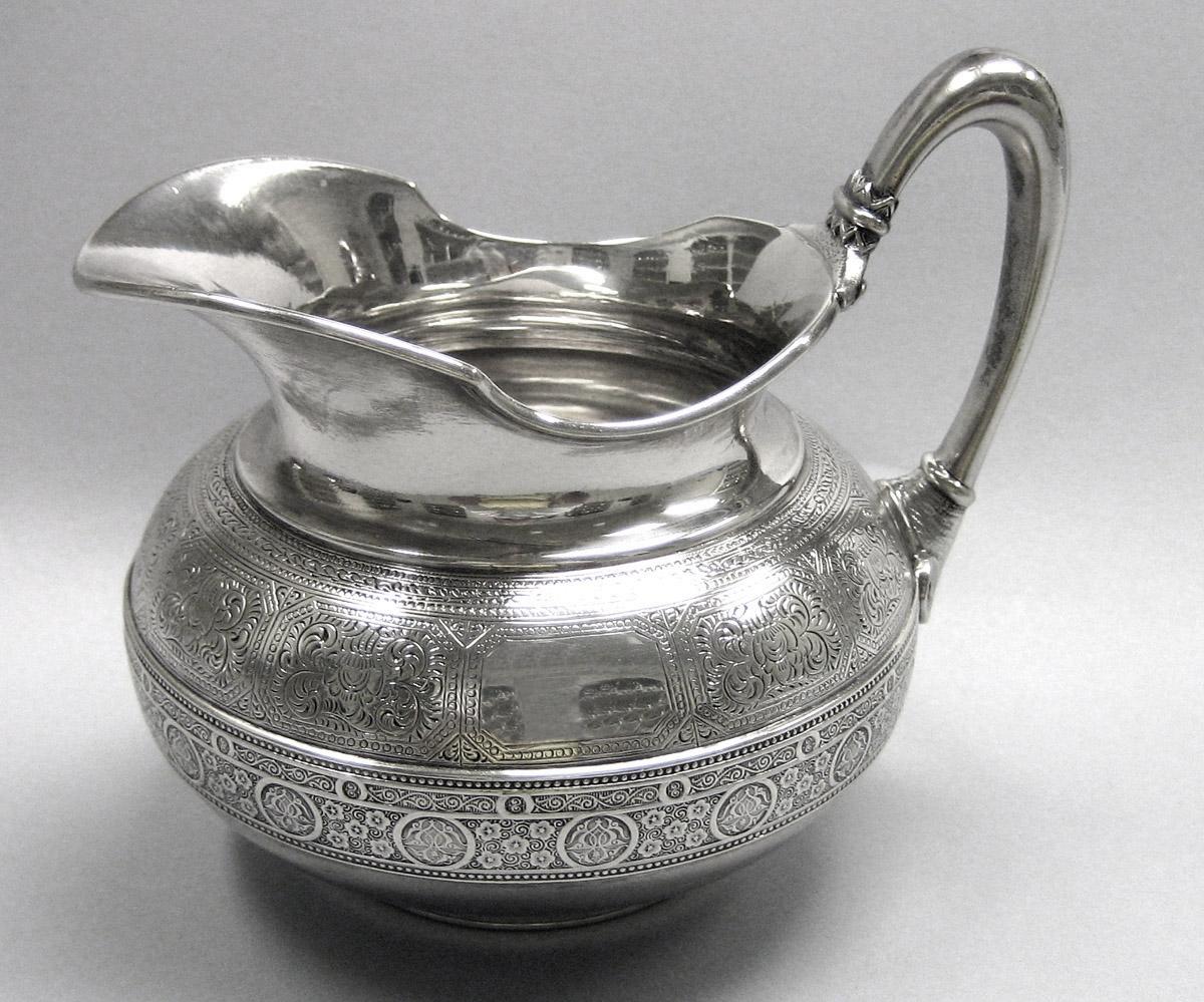 1970.1039.008 Cream pot, side 2