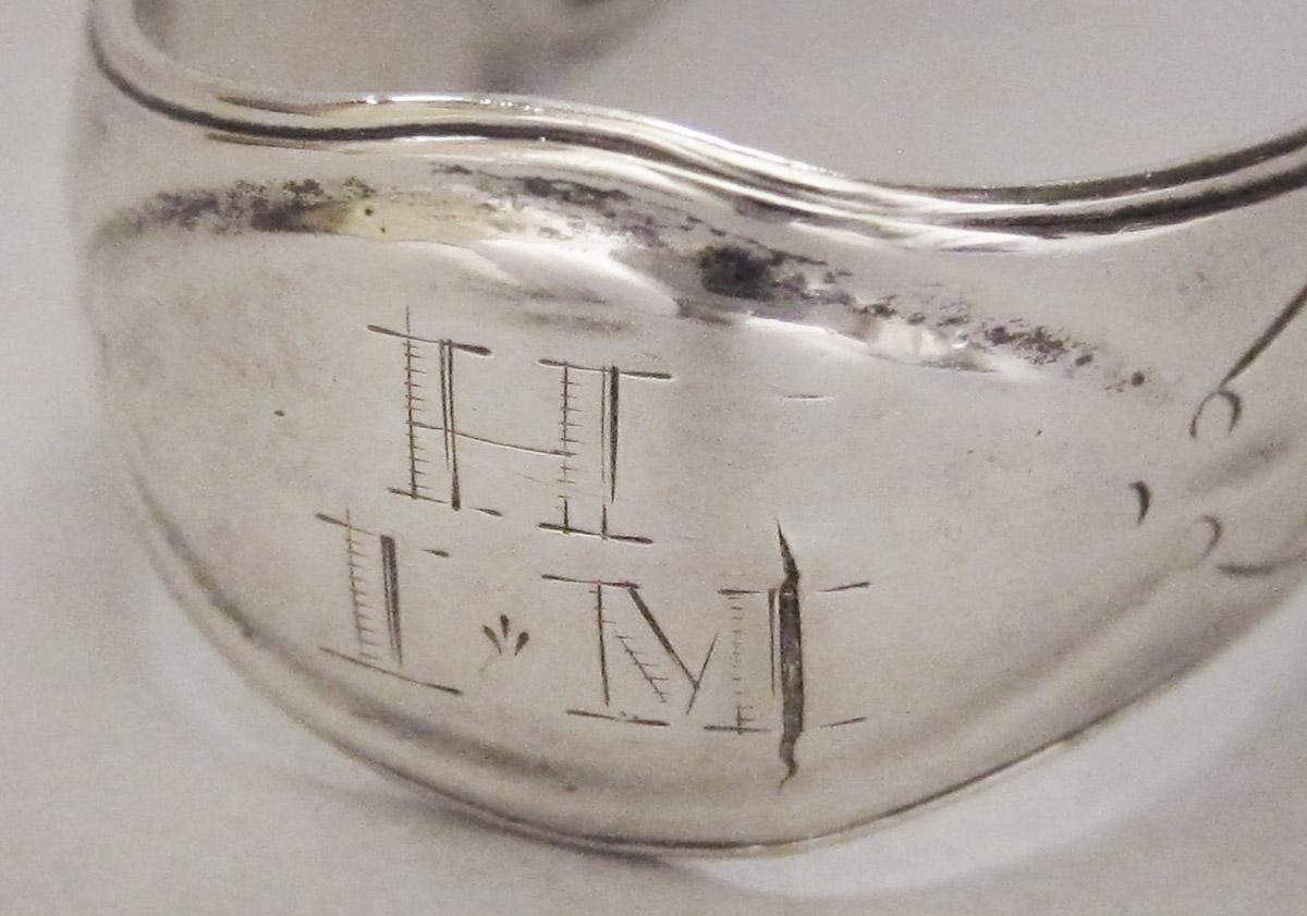 1970.1041 Tongs, engraving