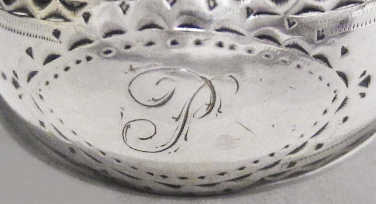 1970.1052 Tongs, engraving