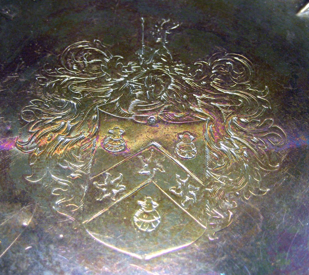 1970.1237 Silver Bottle coaster engraved decoration