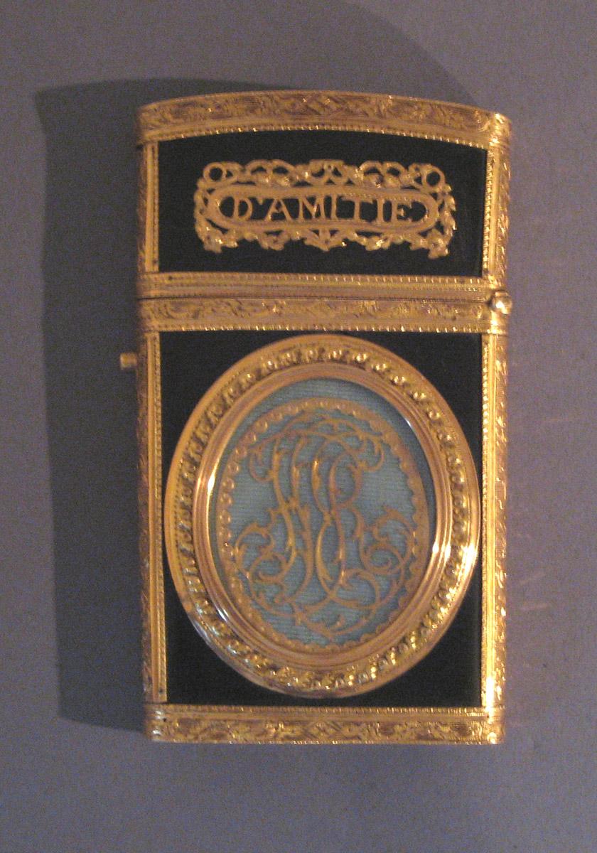 1970.1284 A-C Memo holder (detail 1)