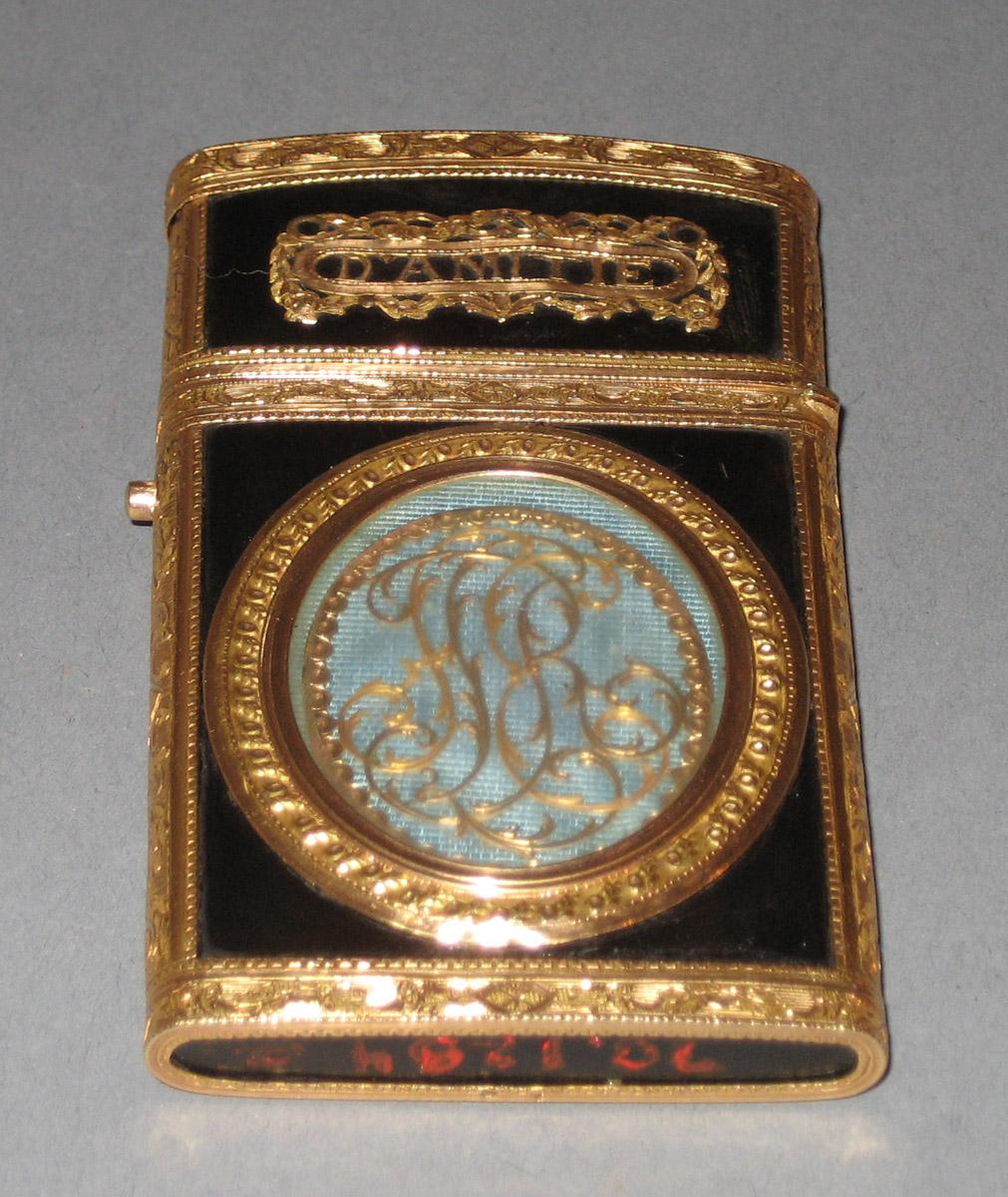 1970.1284 A-C Memo holder (detail 2)